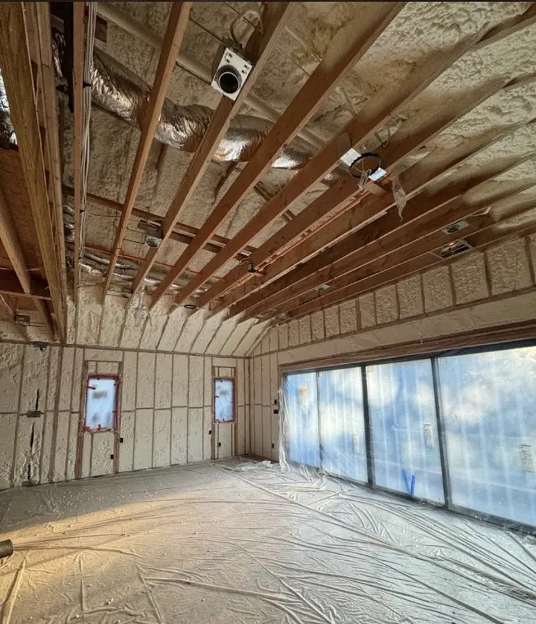 Interior walls and ceiling insulated with spray foam during new construction in San Fernando
